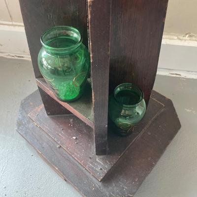 Unique arts & crafts table with small green vases and pic