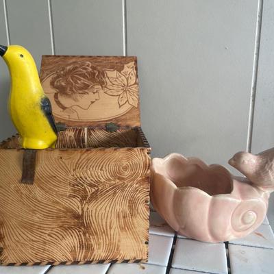 Tile top table with vintage bird decor
