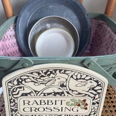 Chair with rabbit crossing sign and basket