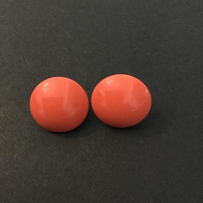 Vintage coral Bakelite circular screw back earrings