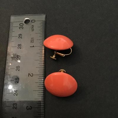 Vintage coral Bakelite circular screw back earrings