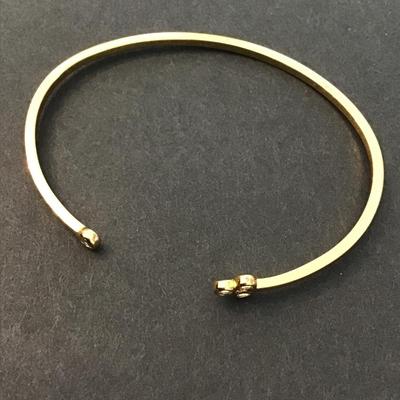 Dainty gold toned rhinestone cuff bracelet