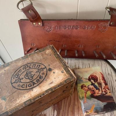 Arctic Cat wood and leather holder