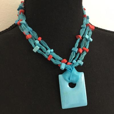 Gorgeous, multi strand ribbon, bow, turquoise, and coral bead statement necklace