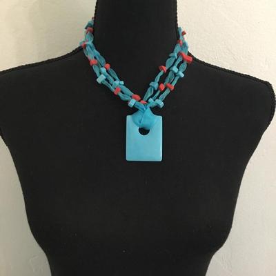 Gorgeous, multi strand ribbon, bow, turquoise, and coral bead statement necklace