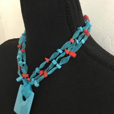 Gorgeous, multi strand ribbon, bow, turquoise, and coral bead statement necklace