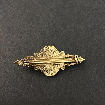 Signed 1928 Victorian style pink ceramic brooch