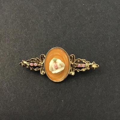 Signed 1928 Victorian style pink ceramic brooch