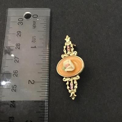 Signed 1928 Victorian style pink ceramic brooch