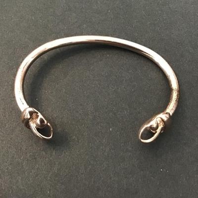 Rose gold tone brooch