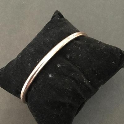 Rose gold tone brooch