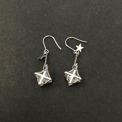 Silver tone star & crystal dangle earrings