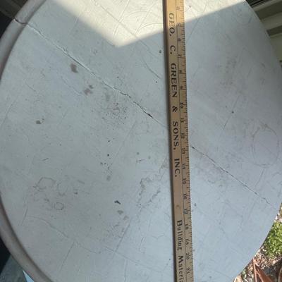 Vintage round table with metal legs