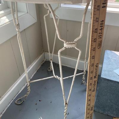 Vintage round table with metal legs
