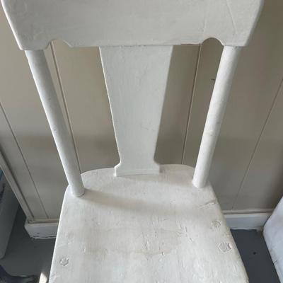Painted white chair with pillow