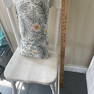 Painted white chair with pillow
