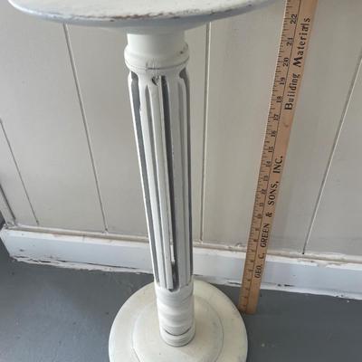 Vintage pedestal table with Indian prayer and small basket