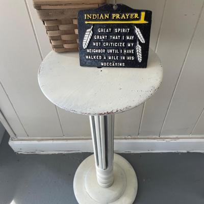Vintage pedestal table with Indian prayer and small basket
