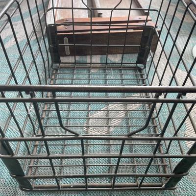 Metal crate with wood items