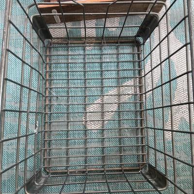 Metal crate with wood items