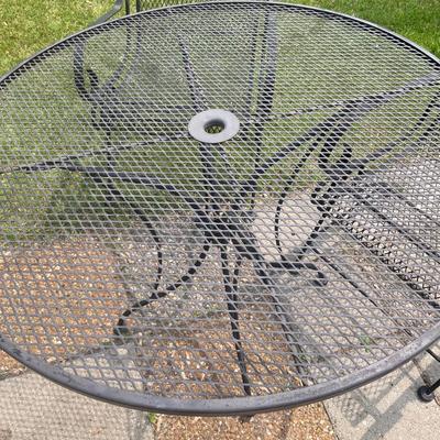 Wrought iron table and 2 chairs