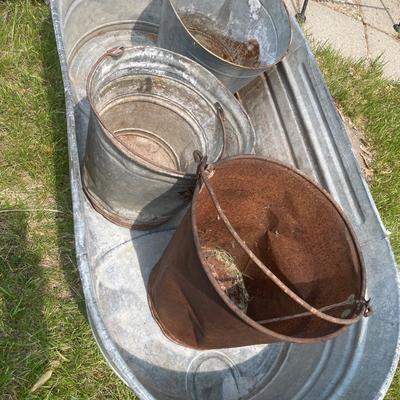 Large metal Wheeling tub with small pails inside