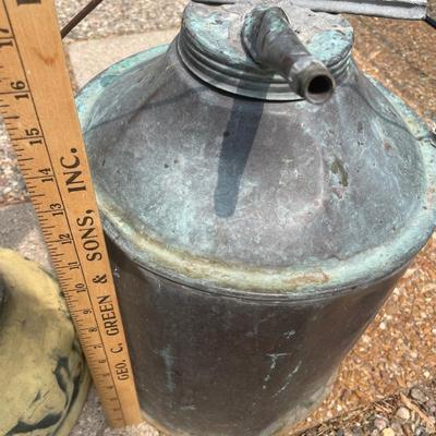 Pottery bowl with vintage gas can