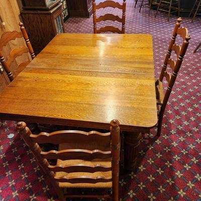 Oak Table w 4 Ladder Back Rush seat Chairs 43"x42" with 3 10" Leaves
