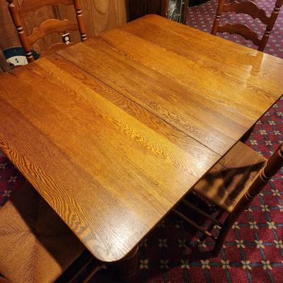 Oak Table w 4 Ladder Back Rush seat Chairs 43"x42" with 3 10" Leaves