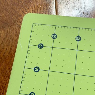 LOT 152L: Fiskars 24 x 6 inch Acrylic Ruler, Fiskars 24 x 18 inch Cutting Mat, XL Watercolor Paper Pad & Vintage Wiss Model C Pinking...