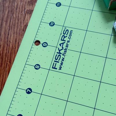 LOT 152L: Fiskars 24 x 6 inch Acrylic Ruler, Fiskars 24 x 18 inch Cutting Mat, XL Watercolor Paper Pad & Vintage Wiss Model C Pinking...
