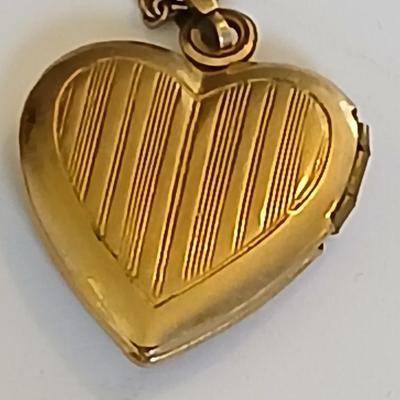 Vintage Gold-Tone Jewelry Lot – Heart Locket, “Grandma” Charm Necklace, and Textured Cuff Bracelet