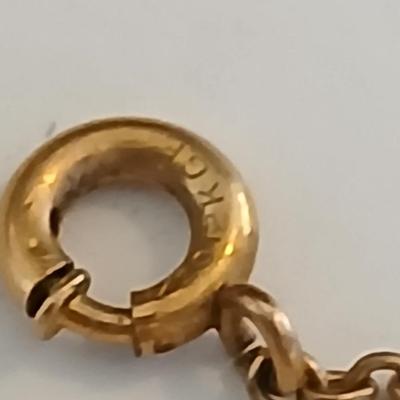 Vintage Gold-Tone Jewelry Lot – Heart Locket, “Grandma” Charm Necklace, and Textured Cuff Bracelet