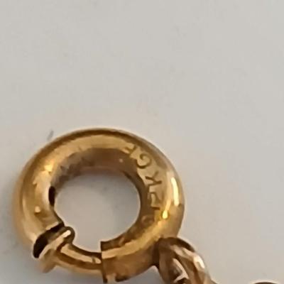 Vintage Gold-Tone Jewelry Lot – Heart Locket, “Grandma” Charm Necklace, and Textured Cuff Bracelet