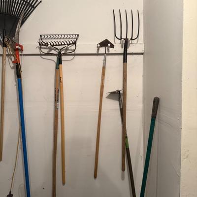 Sale Photo Thumbnail #32: Tidy up your yard or tackle your next landscaping project with this quality collection of long-handle garden tools. All tools are in good used condition and ready for immediate use.

Includes:

2 large garden rakes (one plastic leaf rake, one metal bow ra
