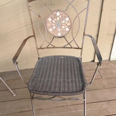 Sale Photo Thumbnail #48: Add charm to your patio or porch with this decorative 3-piece bistro set. The set includes two matching metal chairs with beautiful mosaic-style medallion backs and a round, tile-top table.

? The table features neutral stone-look tiles in a checkerboard 