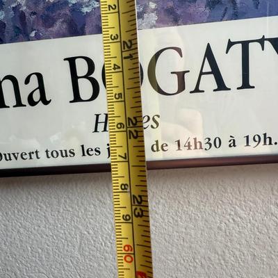 Sale Photo Thumbnail #53: Elegant and collectible poster from French artist Éléna Bogatyr, advertising her 2001 solo exhibit in Dinan, France. Features one of her signature impressionist-style oil paintings of a rustic cottage and floral field. Professionally framed and ready to