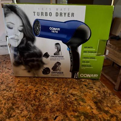 Sale Photo Thumbnail #58: Powerful and compact, this Conair 1875 Turbo Dryer features ionic technology for smoother, shinier hair and faster drying. Comes brand new in original box with attachments included.

Features:

1875 watts of power

Ionic technology reduces frizz

2 heat /
