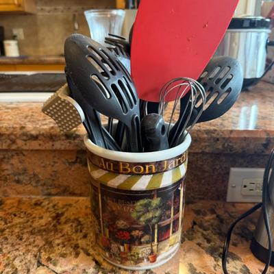Sale Photo Thumbnail #68: French-style ceramic crock marked "Au Bon Jardinier" filled with assorted cooking utensils including spatulas, ladles, and whisks. Perfect countertop companion for everyday cooks.