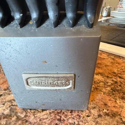 Sale Photo Thumbnail #79: Cuisinart 15-piece knife set in a heavy-duty gray block. Includes steak knives, chef's knife, bread knife, paring knife, and more. Handles show some wear but great for everyday use.