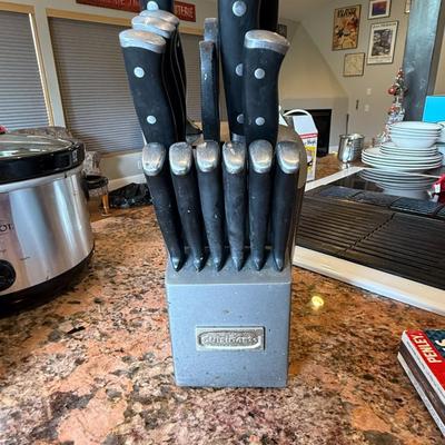 Sale Photo Thumbnail #78: Cuisinart 15-piece knife set in a heavy-duty gray block. Includes steak knives, chef's knife, bread knife, paring knife, and more. Handles show some wear but great for everyday use.