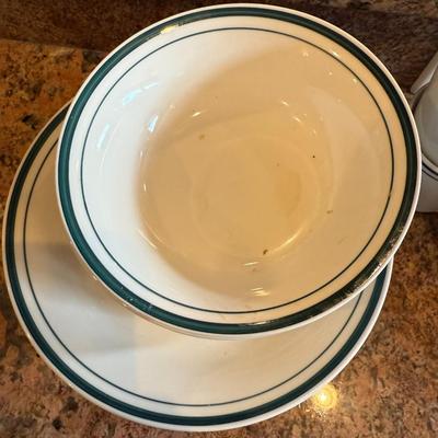 Sale Photo Thumbnail #87: lassic white ceramic dishes with a blue rim. Includes dinner plates and shallow bowls—great for everyday use or adding to an existing set