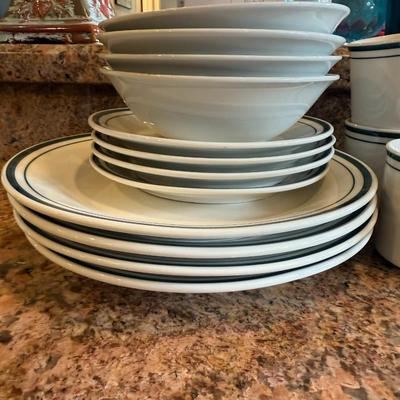 Sale Photo Thumbnail #83: lassic white ceramic dishes with a blue rim. Includes dinner plates and shallow bowls—great for everyday use or adding to an existing set