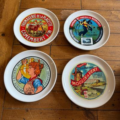 Sale Photo Thumbnail #88: Charming vintage-style appetizer or dessert plates featuring colorful French Camembert cheese label art. Ideal for entertaining, charcuterie boards, or farmhouse décor.