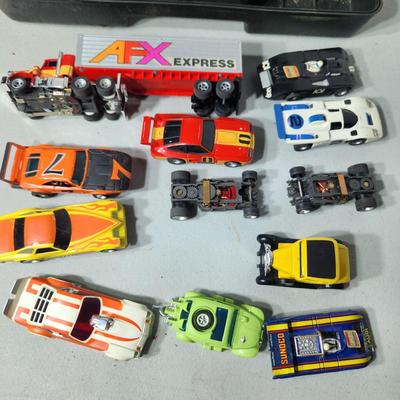 Large Lot of AFX Slot Cars and Trucks w 2 hard shell cases