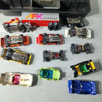 Large Lot of AFX Slot Cars and Trucks w 2 hard shell cases