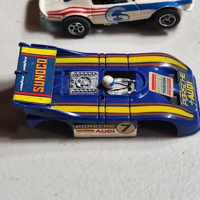 Large Lot of AFX Slot Cars and Trucks w 2 hard shell cases