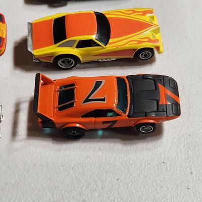 Large Lot of AFX Slot Cars and Trucks w 2 hard shell cases