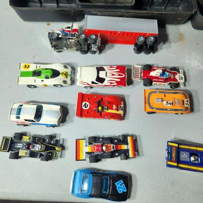 Large Lot of AFX Slot Cars and Trucks w 2 hard shell cases
