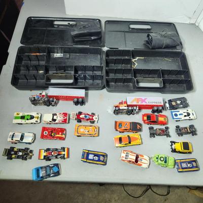 Large Lot of AFX Slot Cars and Trucks w 2 hard shell cases